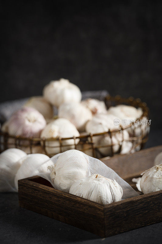 fresh garlic on a wooden table